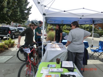 Riders learn about how to prevent exposure during a long disaster recovery ride from King County Medical Reserve Corps members.